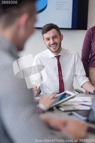 Image of young business people group on meeting at modern office