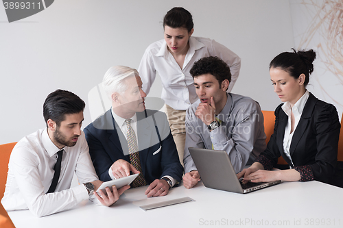 Image of business people group on meeting at modern startup office