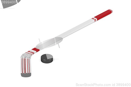 Image of Ice hockey stick and puck