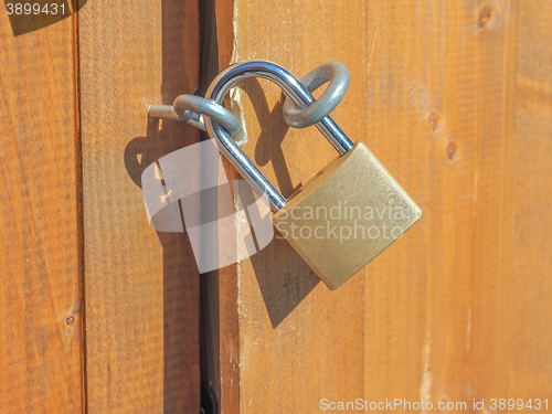 Image of Padlock on a wood door