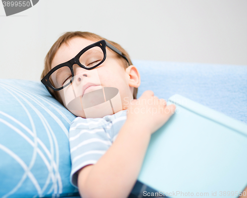 Image of Cute little boy is sleeping