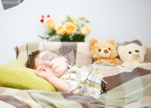 Image of Cute little boy is sleeping