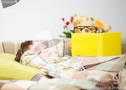 Image of Cute little boy is sleeping