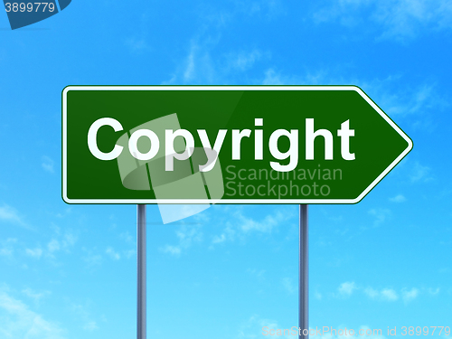 Image of Law concept: Copyright on road sign background