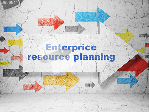 Image of Business concept: arrow with Enterprice Resource Planning on grunge wall background
