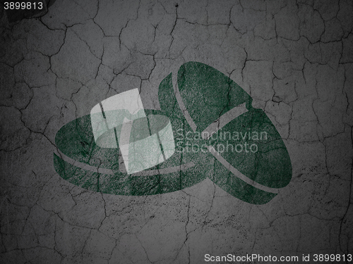 Image of Medicine concept: Pills on grunge wall background