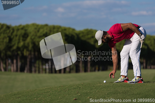 Image of golf player hitting long shot