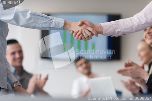 Image of business womans handshake