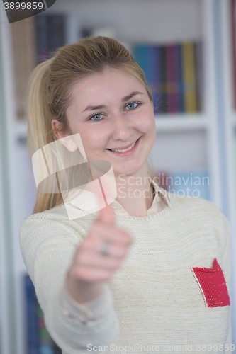 Image of portrait of female student in library