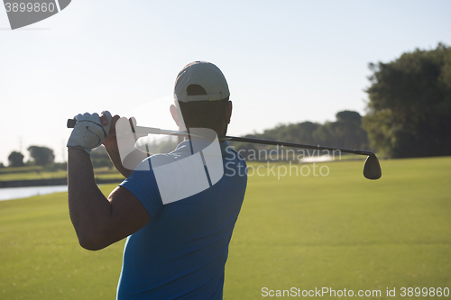 Image of golf player hitting shot