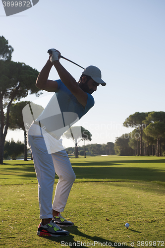 Image of golf player hitting shot