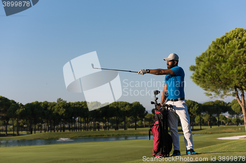 Image of golfer  portrait at golf  course