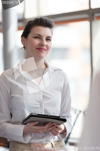 Image of young businesswoman portrait at office