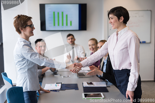 Image of business womans handshake