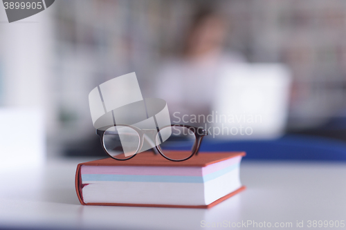Image of female student study in school library