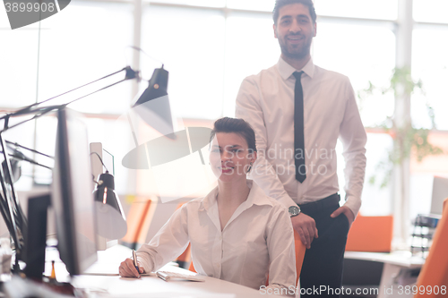 Image of portrait of business couple at office