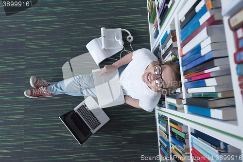 Image of female student study in library