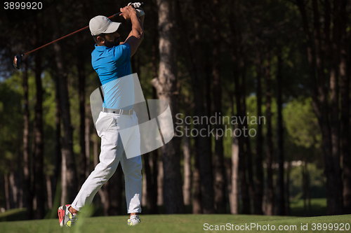 Image of golf player hitting shot