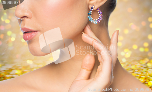 Image of close up of beautiful woman face with earring