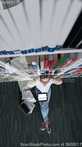 Image of female student study in library