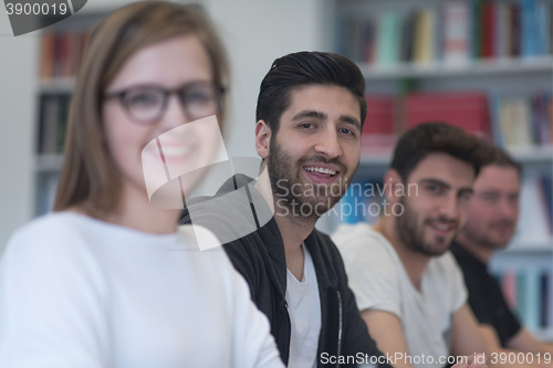 Image of group of students study together in classroom