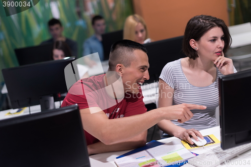 Image of technology students group working  in computer lab school  class