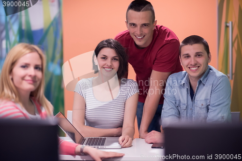 Image of technology students group in computer lab school  classroom