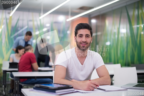 Image of male student in classroom