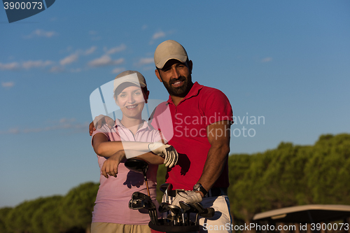 Image of portrait of couple on golf course