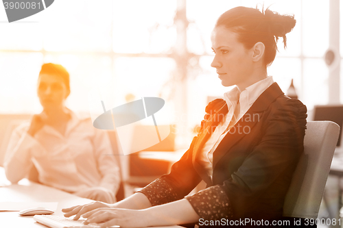 Image of business woman at  office people group on meeting  in background