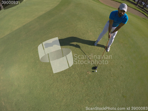 Image of top view of golf player hitting shot