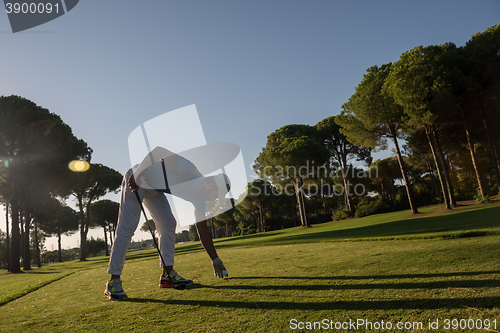 Image of golf player hitting shot