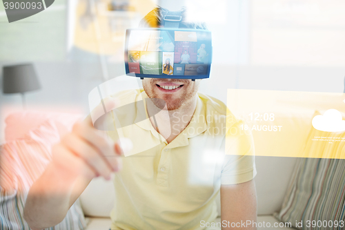 Image of young man in virtual reality headset or 3d glasses