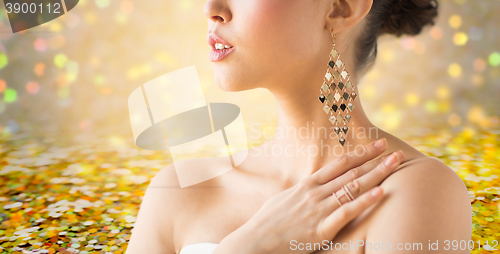 Image of close up of beautiful woman with earrings