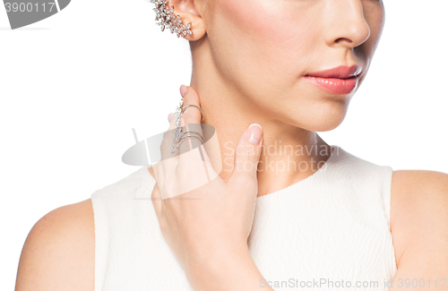 Image of close up of beautiful woman with ring and earring