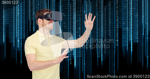 Image of happy man in virtual reality headset or 3d glasses