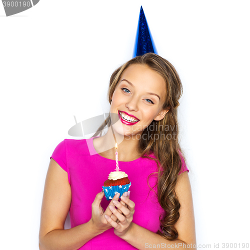 Image of happy woman or teen girl with birthday cupcake