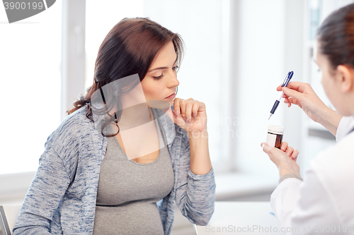 Image of gynecologist doctor and pregnant woman at hospital