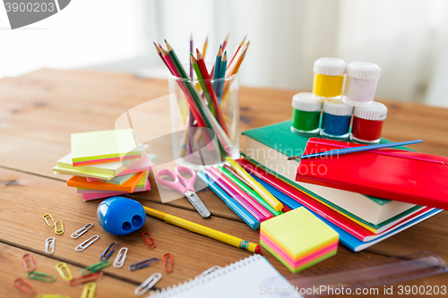 Image of close up of stationery or school supplies on table