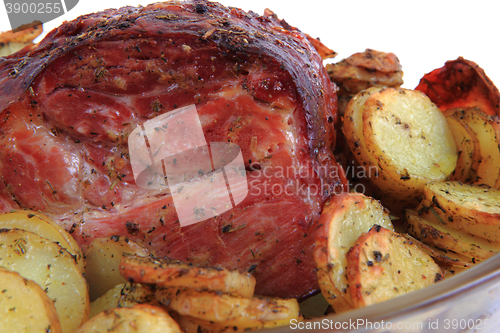 Image of smoked and grilled meat with potatoes slice