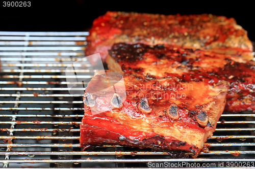 Image of pork ribs on the grill