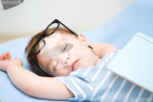 Image of Cute little boy is sleeping