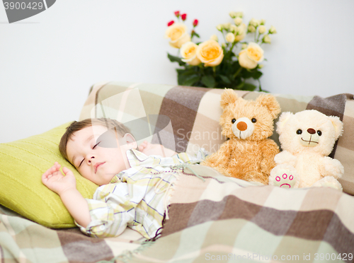 Image of Cute little boy is sleeping