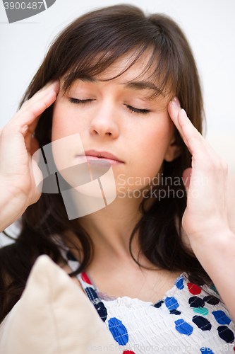 Image of Woman is suffering headache
