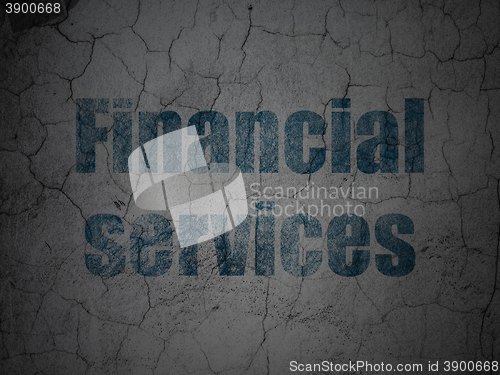 Image of Currency concept: Financial Services on grunge wall background