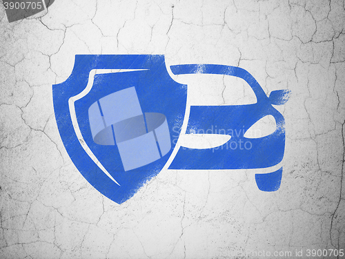 Image of Insurance concept: Car And Shield on wall background