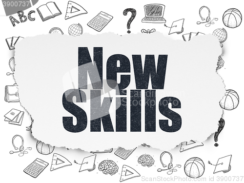 Image of Education concept: New Skills on Torn Paper background