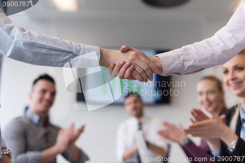 Image of business womans handshake
