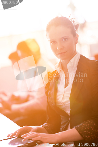 Image of business woman at  office people group on meeting  in background