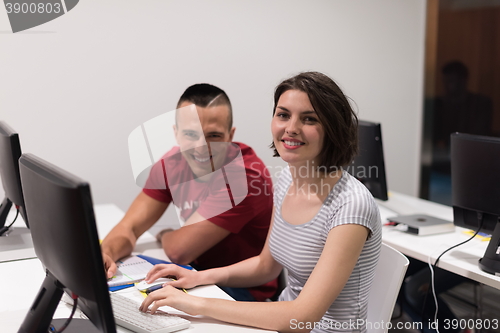 Image of technology students group working  in computer lab school  class
